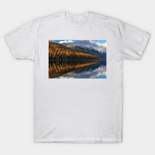 Mountain Peaks Reflect Into Bowman Lake In Autumn Glacier National Park T-Shirt by HammiltenJohn